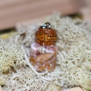 A Handmade Charm Necklace or Keychain. A Tiny bit of oasis in bottle.
